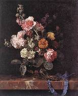 Vase of flowers with watch