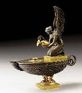 A gilt-bronze and bronze oil lamp, first quarter 19th century