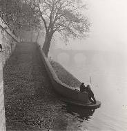 Seine in the mist skaters on canal